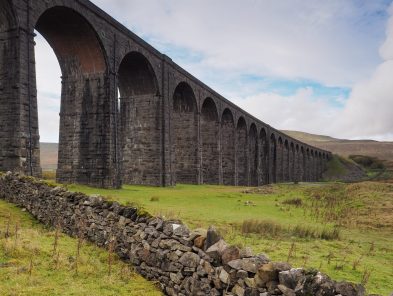 The iconic Ribblehead Viaduct or Batty Moss Viaduct which carries the Settle to Carlisle railway across Batty Moss in the Ribble Valley, Yorkshire Dales, UK